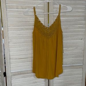 Yellow mustard tank top.